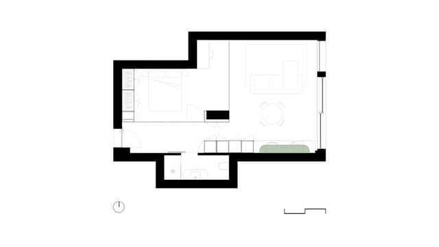 Floor plan of the renovated studio apartment, showing the open living area, kitchen and bathroom.